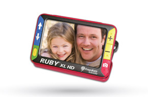 RUBY XL HD handheld video magnifier showing family photo.